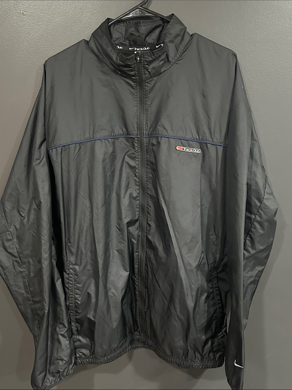 Nike Track Club Storm Men's Black Windbreaker Jacket with Navy Trim